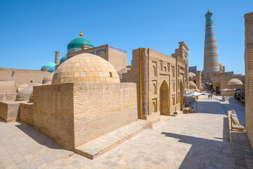 Fototapeta premium Sunny day in the ancient inner city of Ichan-Kala. Khiva, Uzbekistan