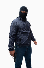 Burglar or terrorist. Holding pistol in various poses on background isolated with clipping path.