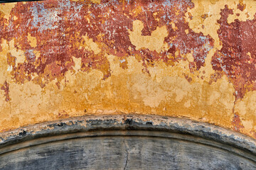 faded and decrepit wall in Olhao, algarve, portugal