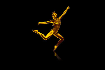 Fototapeta na wymiar Girl gymnastics Jumping in gold