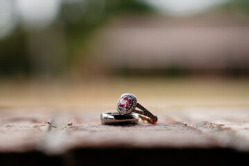 Wedding rings on brick wall