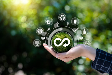 Hand hold the circular economy icon. The concept of eternity, endless and unlimited, circular economy for future growth of business and environment sustainable. - obrazy, fototapety, plakaty