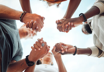 Holding hands, support and friends praying for spiritual growth, community and gratitude together...