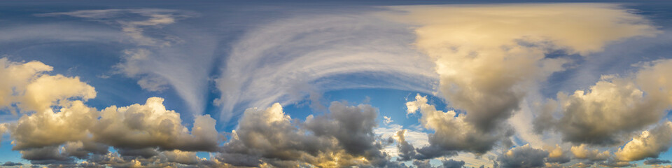 Dramatic sunset sky panorama with Cumulus clouds. Seamless hdr 360 pano in spherical...