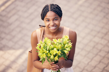 Flowers, gift and black woman with smile for bouquet for birthday or celebration in the street from...