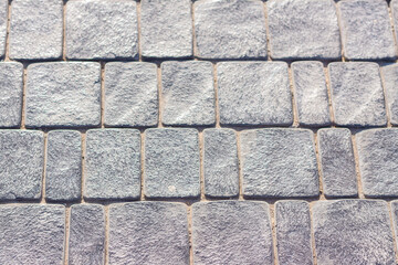 Natural background in the form of cobblestones and paving stones. Rocky background