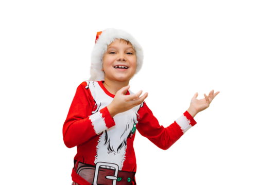 happy smiling caucasian boy in santa tee shirt and hat pointing to blank space on white background for advertising text. High quality photo - Powered by Adobe