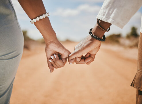 Couple Walking, Promise And Hook Fingers For Support, Trust And Love In Nature Outdoors. Closeup Man, Woman And Connect Pinky Hands In Hope, Respect And Commitment Link Of Save The Date Relationship