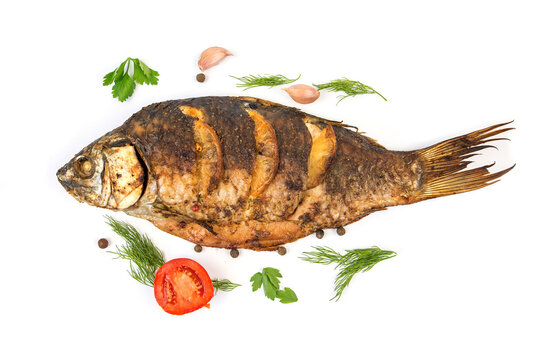 fried or oven baked whole fish isolated