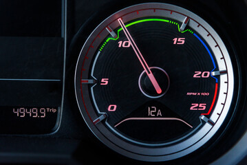 Fototapeta premium Rev counter of a truck, in the lower part of the green zone, where consumption is more economical.