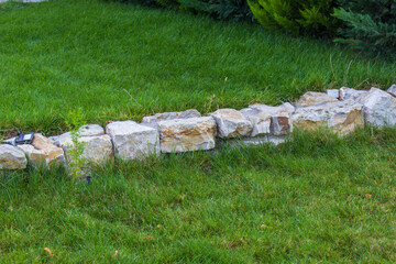 Terrace on the lawn. Border design. Landscaping