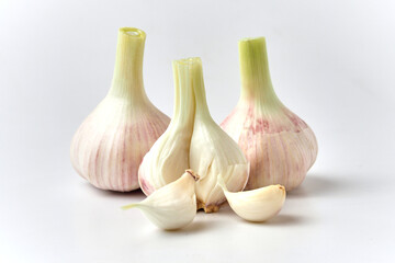 Young garlic on a white background
