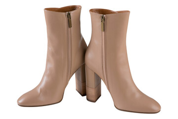 A pair of brown women's boots with a zipper, high heels, on a white background, isolate