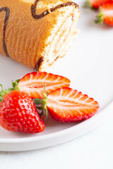 strawberries and cream on a plate