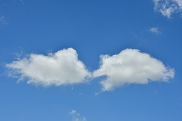 White clouds against blue sky for a backgrounds.