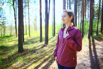 spring forest female windbreaker trekking, springtime rest nature landscape background woman tourist