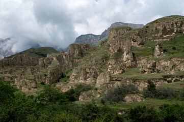 Fototapeta na wymiar Landscape with foggy rocky mountains of North Caucasus