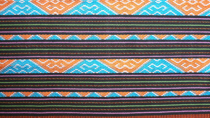 Woven cloth typical of East Nusa Tenggara, Indonesia with beautiful motifs. - obrazy, fototapety, plakaty