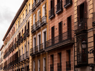 Fototapeta na wymiar Madrid, Spain - January 5 2020: A row of apartment buildings in Madrid, Spain