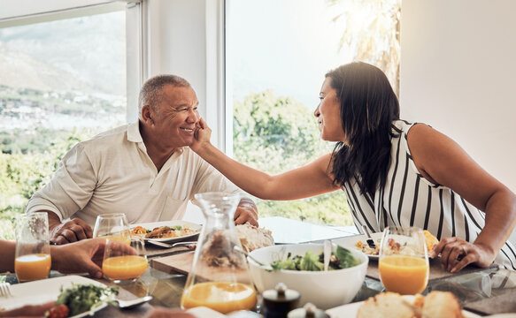 Senior Couple, Love Bonding Or Food In House, Home Or Restaurant In Thanksgiving, Marriage Anniversary Or Celebration Event. Smile, Happy Or Retirement Elderly Man And Mexican Woman With Festive Meal