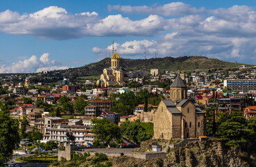 General view of Tbilisi, Metehi Church and Holy Trinity Cathedral in Tbilisi, Georgia - obrazy, fototapety, plakaty