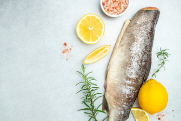 Salmon fish or raw rainbow trout on a light background. Simple seafood recipe. place for text, top view