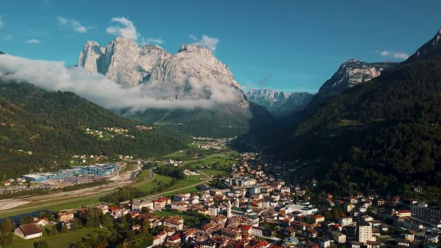 City of Agordo in Italy, surrounded by mountain peaks, beautifull green valeys.