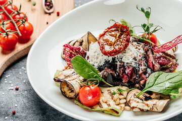 steak barbecue sliced with salad grilled vegetables, nuts, sauce and parmesan. Italian cuisine concept. banner, menu, recipe place for text, top view