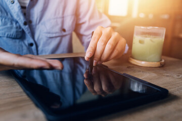 Business team present. professional investor working new start up project. Finance managers meeting.Digital tablet docking screen computer design smart phone using, in morning light