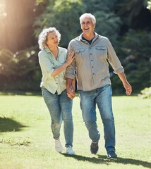 Senior couple walking in park, garden and sunshine to relax, wellness and fresh air in nature in...