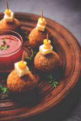 Corn Cheese balls with dip - popular party snack from India