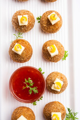 Corn Cheese balls with dip - popular party snack from India