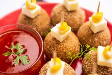 Corn Cheese balls with dip - popular party snack from India