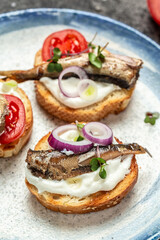 Sandwich with sprats. Sprat in oil, Danish cuisine. Food recipe background. Close up