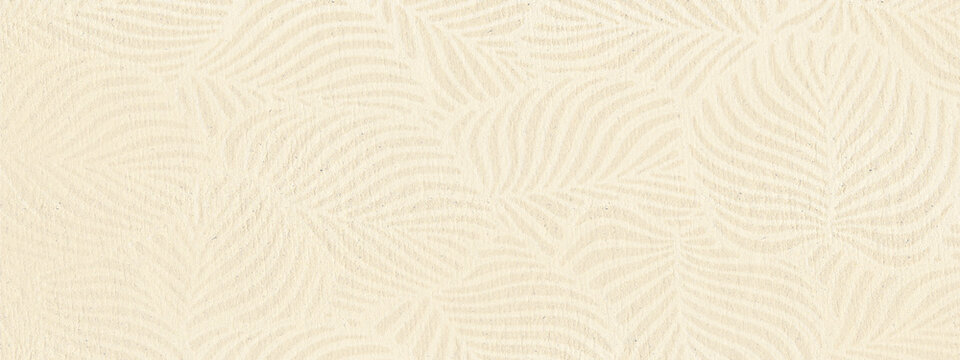 Fototapeta Panoramic background in ecru tones with subtle leaves pattern. Recycled paper texture.  