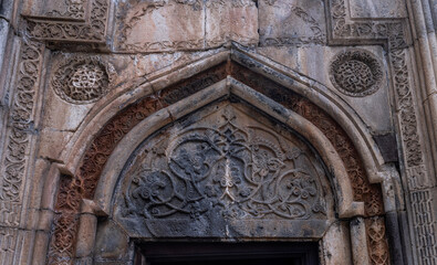 Obraz premium Reliefs carved from stone in Geghard monastery, Armenia
