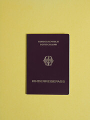 Burgundy red biometric German youth passport covers called Kinderreisepass with eagle...