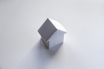 Paper house origami isolated on a white background