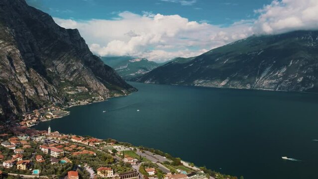Limone Town in Italy on the Lake Garda, beautiful mountain views, old town red roofs, green lake.