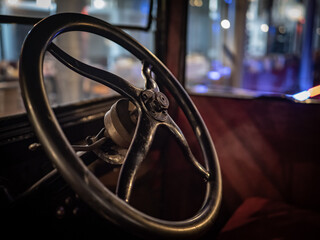 Dashboard and steering wheel of old-timer car