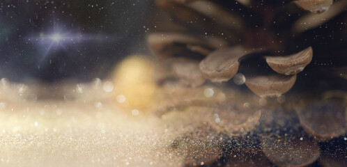 Pinecone with Defocused Ornament and Defocused Lights. Christmas Time