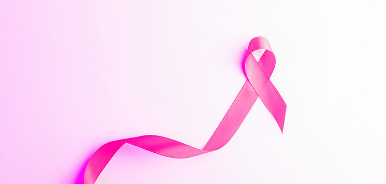 Cancer awareness. Health care symbol pink ribbon on white background. Breast woman support concept. World cancer day.