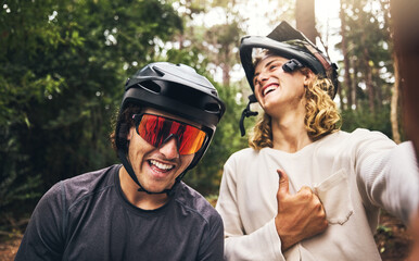 Friends, cycling men and selfie in forest, park or woods cyclist trail in nature. Thumbs up, fitness and cyclists, bikers or bike rider smile in mountain biking helmets in park outdoor bicycle ride.