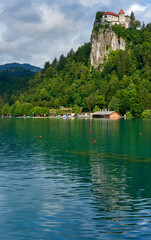 Fototapeta na wymiar Scenic view on rock castle on Bled lake