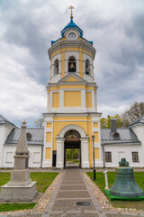 Fototapeta na wymiar Russia. Leningrad region. May 29, 2022. Bell tower of the Nativity of the Theotokos Monastery on the island of Konevets.
