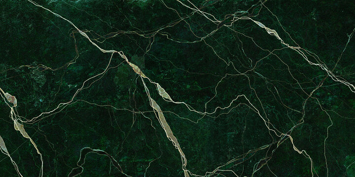 green marble texture background with white curly veins. closeup surface granite stone texture for ceramic wall tile, flooring and kitchen design. polished quartz, quartzite matt limestone.