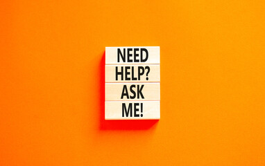 Support and need help ask me symbol. Concept words Need help ask me on wooden blocks on a beautiful orange table orange background. Business, support and Need help ask me concept.