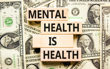 Mental health psychological symbol. Concept words Mental health is health on wooden blocks on a...