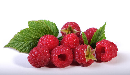 berries and raspberry leaves on a white background