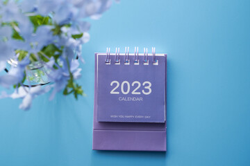 purple 2023 desk calendar with purple flower top view